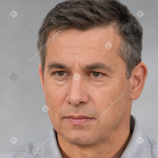 Neutral white adult male with short  brown hair and brown eyes