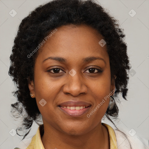 Joyful black young-adult female with medium  brown hair and brown eyes