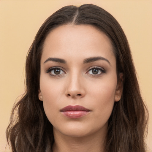 Neutral white young-adult female with long  brown hair and brown eyes