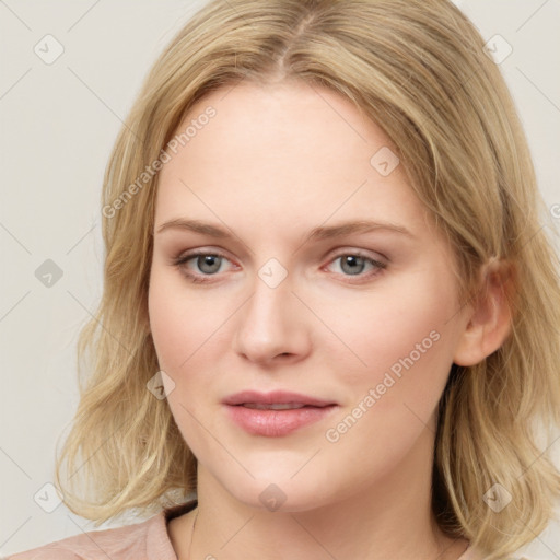 Joyful white young-adult female with medium  brown hair and blue eyes