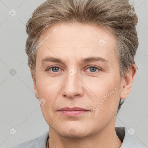 Joyful white adult male with short  brown hair and grey eyes