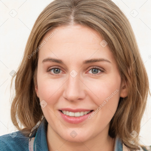 Joyful white young-adult female with medium  brown hair and blue eyes