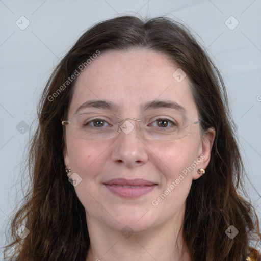 Joyful white adult female with long  brown hair and grey eyes