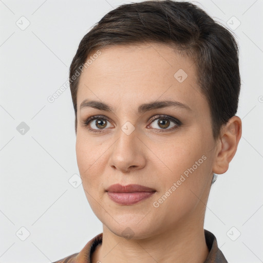 Joyful white young-adult female with short  brown hair and brown eyes