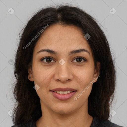 Joyful latino young-adult female with medium  brown hair and brown eyes