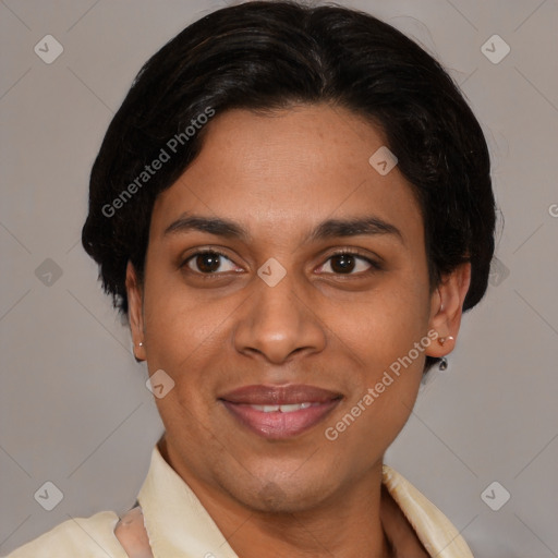 Joyful latino adult female with short  brown hair and brown eyes