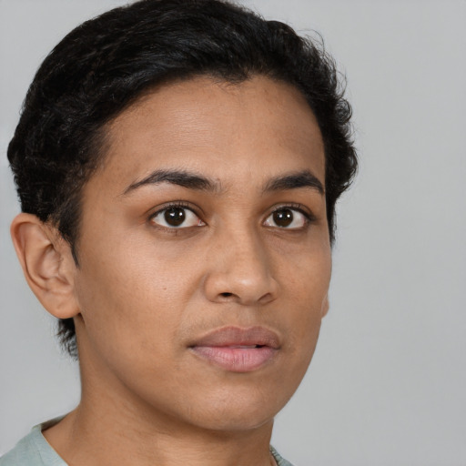 Neutral latino young-adult female with short  brown hair and brown eyes