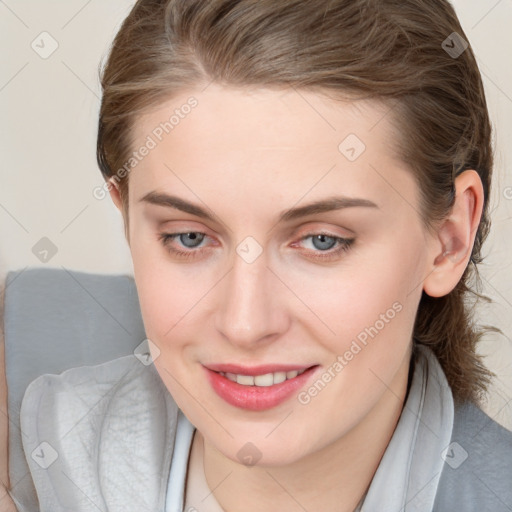 Joyful white young-adult female with medium  brown hair and blue eyes