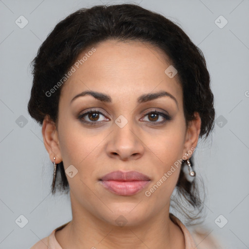 Joyful latino young-adult female with medium  brown hair and brown eyes