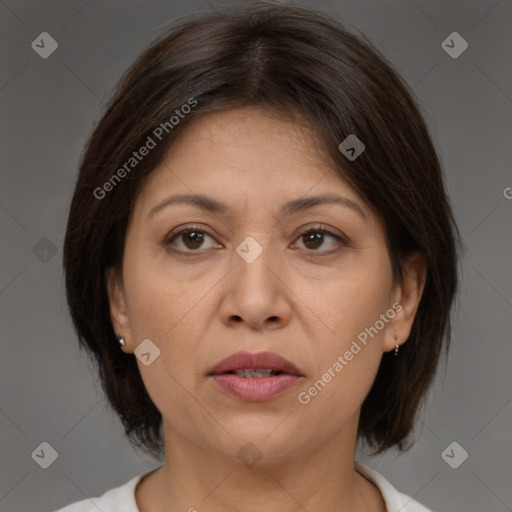 Joyful white adult female with medium  brown hair and brown eyes