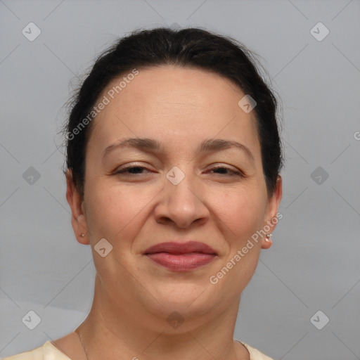 Joyful white adult female with short  brown hair and brown eyes