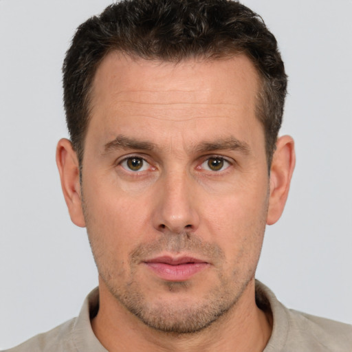 Neutral white adult male with short  brown hair and brown eyes