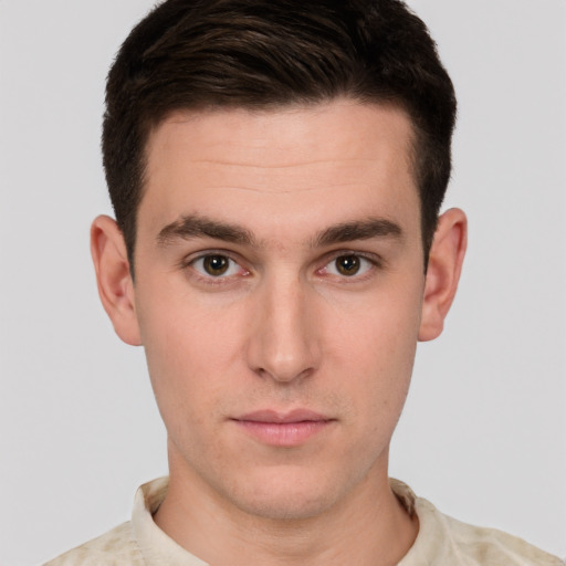 Neutral white young-adult male with short  brown hair and brown eyes