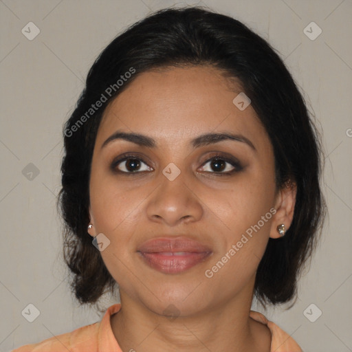 Joyful black young-adult female with medium  brown hair and brown eyes