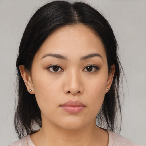 Neutral asian young-adult female with medium  black hair and brown eyes