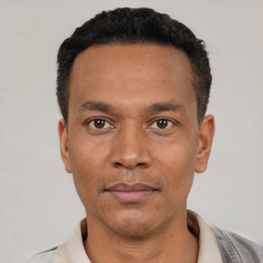 Neutral latino adult male with short  black hair and brown eyes