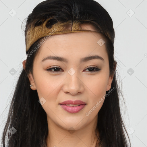 Joyful asian young-adult female with long  brown hair and brown eyes