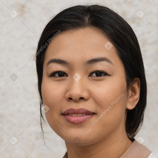 Joyful asian young-adult female with medium  brown hair and brown eyes