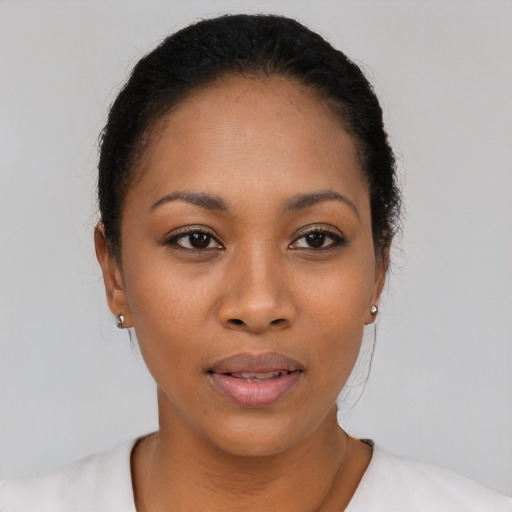Neutral latino young-adult female with short  black hair and brown eyes