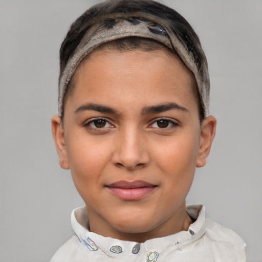 Joyful latino young-adult female with short  brown hair and brown eyes