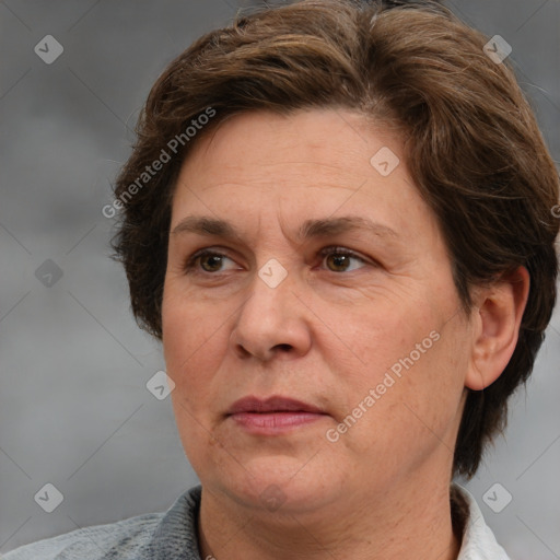 Joyful white adult female with short  brown hair and brown eyes