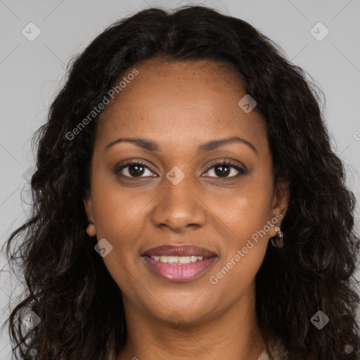 Joyful black young-adult female with long  brown hair and brown eyes