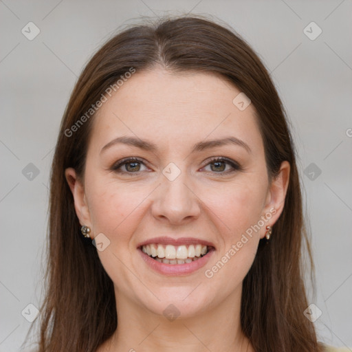 Joyful white young-adult female with long  brown hair and grey eyes