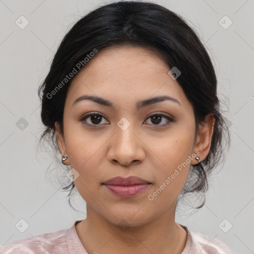 Joyful latino young-adult female with medium  black hair and brown eyes