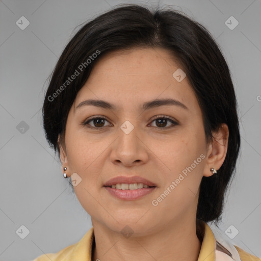 Joyful latino young-adult female with medium  brown hair and brown eyes