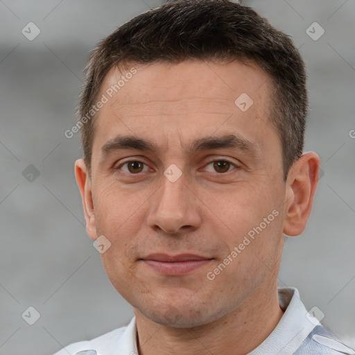 Joyful white adult male with short  brown hair and brown eyes