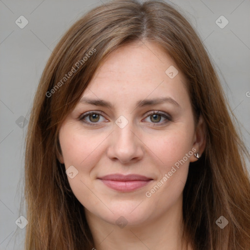 Joyful white young-adult female with long  brown hair and grey eyes