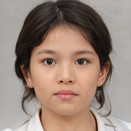 Neutral asian child female with medium  brown hair and brown eyes