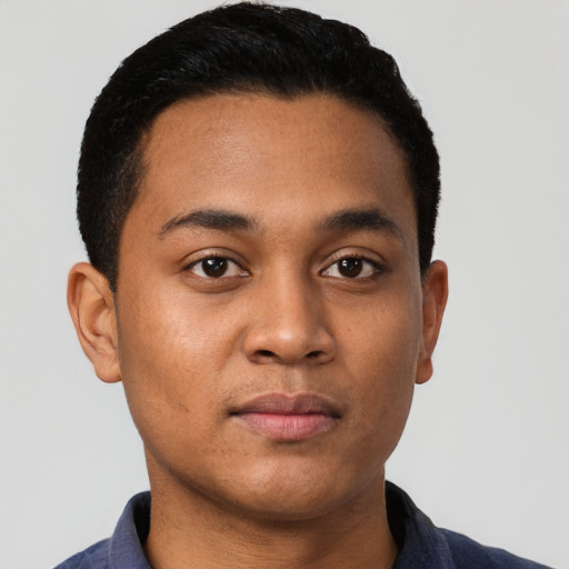 Neutral latino young-adult male with short  brown hair and brown eyes