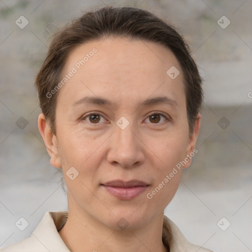 Joyful white adult female with short  brown hair and brown eyes