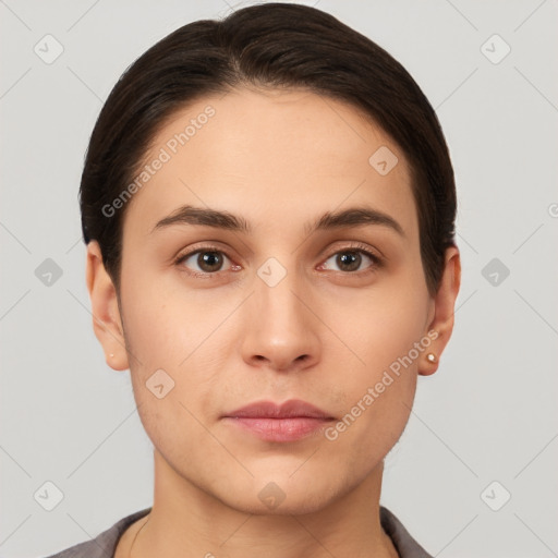 Neutral white young-adult female with short  brown hair and brown eyes