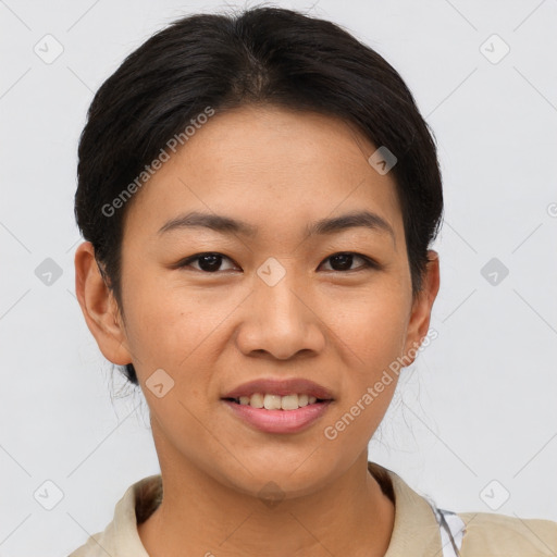 Joyful asian young-adult female with short  brown hair and brown eyes