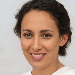 Joyful white adult female with short  brown hair and brown eyes