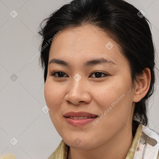 Joyful asian young-adult female with medium  brown hair and brown eyes