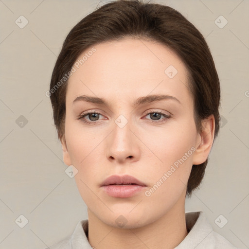 Neutral white young-adult female with medium  brown hair and brown eyes