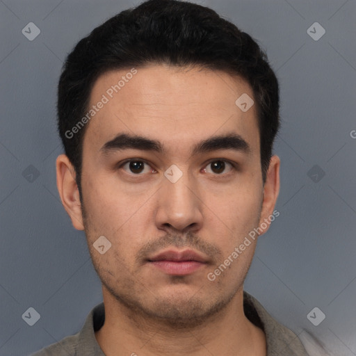 Neutral white young-adult male with short  black hair and brown eyes