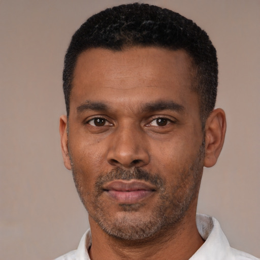 Neutral black young-adult male with short  black hair and brown eyes