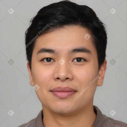 Joyful asian young-adult male with short  black hair and brown eyes