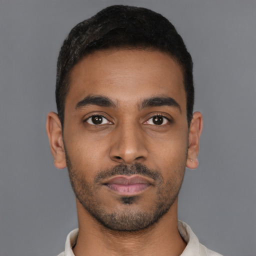 Neutral black young-adult male with short  brown hair and brown eyes