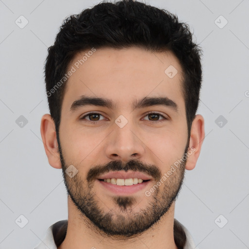 Joyful white young-adult male with short  black hair and brown eyes