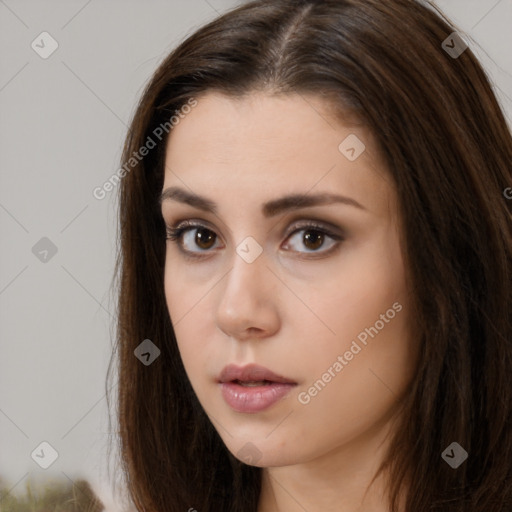 Neutral white young-adult female with long  brown hair and brown eyes