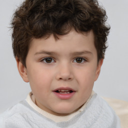 Joyful white child male with short  brown hair and brown eyes