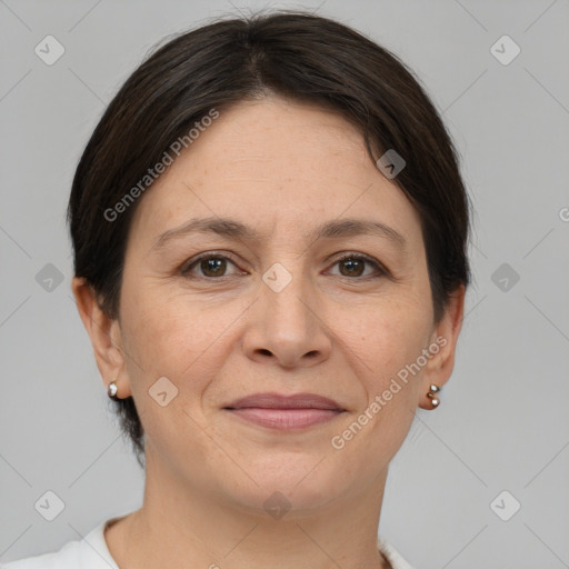 Joyful white adult female with short  brown hair and brown eyes