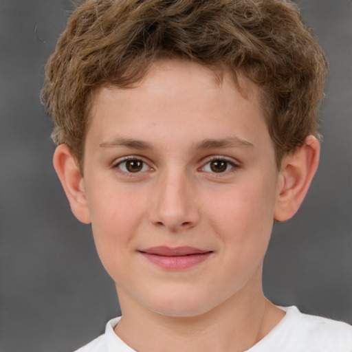 Joyful white child male with short  brown hair and brown eyes