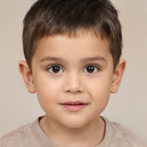 Joyful white child male with short  brown hair and brown eyes