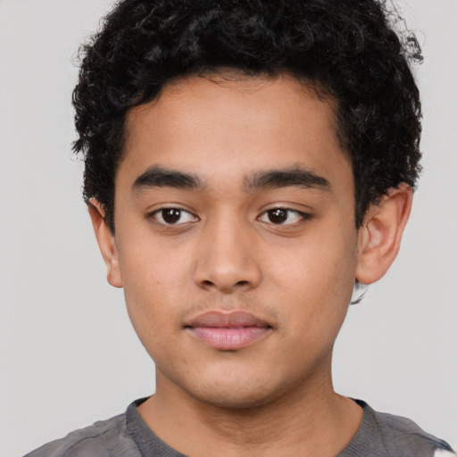 Neutral latino child male with short  black hair and brown eyes